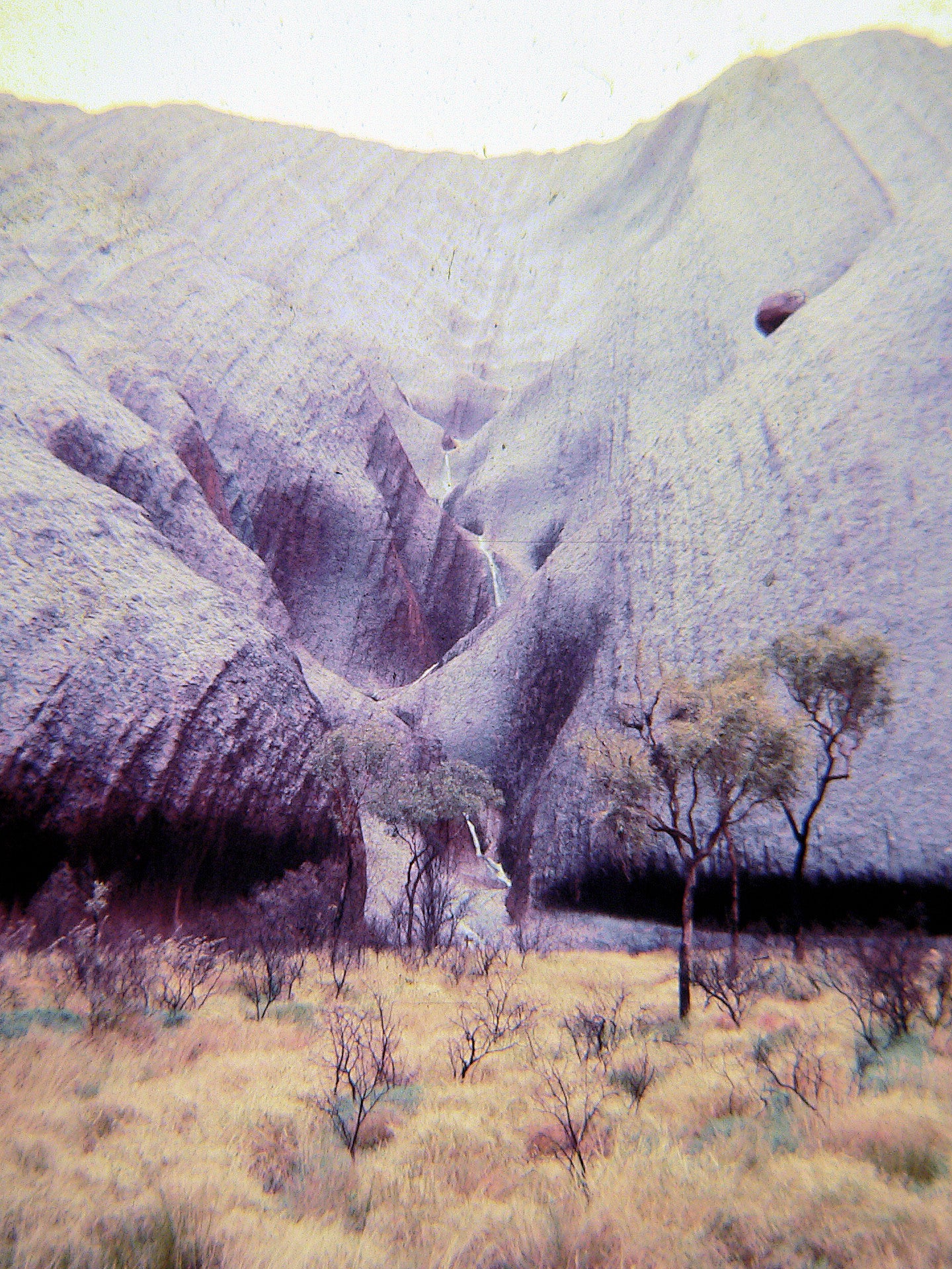 'ULURU IN FLOOD 3' 1981 IAN R. JARDINE LIMITED EDITION FRAMED CANVAS PRINT